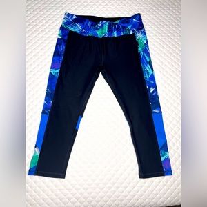 RBX Capri Length Leggings in black with bright blue/green detailing